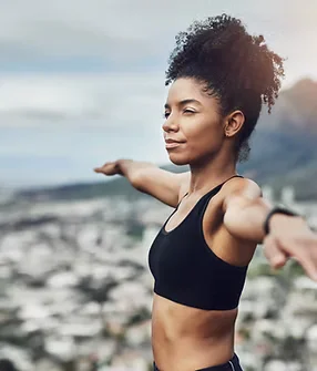 Active sportswoman receiving acupuncture - Traditional Chinese Medicine for athletic performance and injury recovery